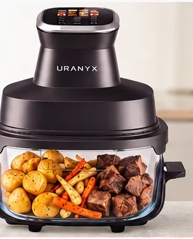 URANYx UAF001 空气炸锅,玻璃锅内为烤蔬菜和肉块